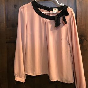Light pink/nude blouse with black bow